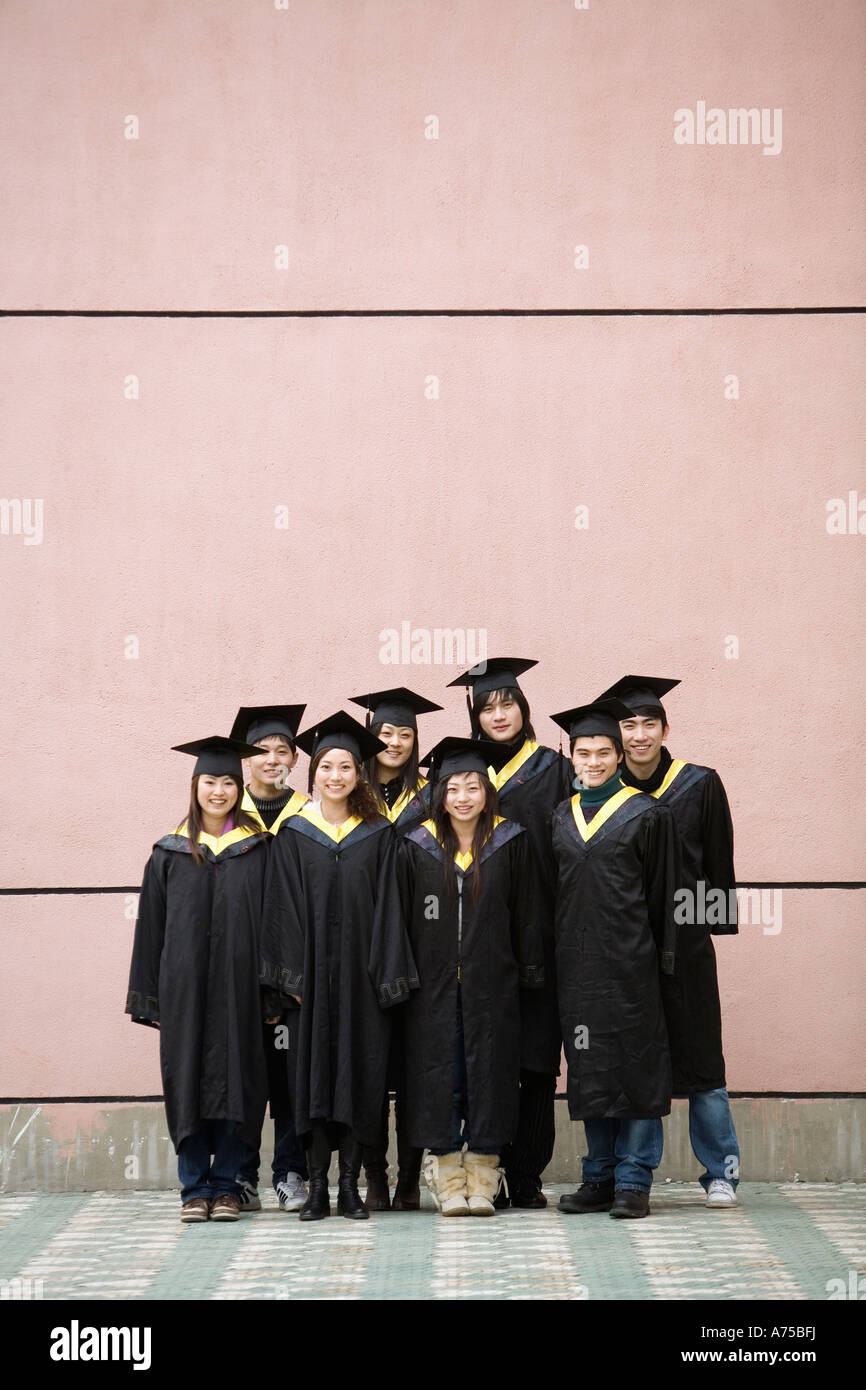 Studenten für Graduierung Bild posieren Stockfoto