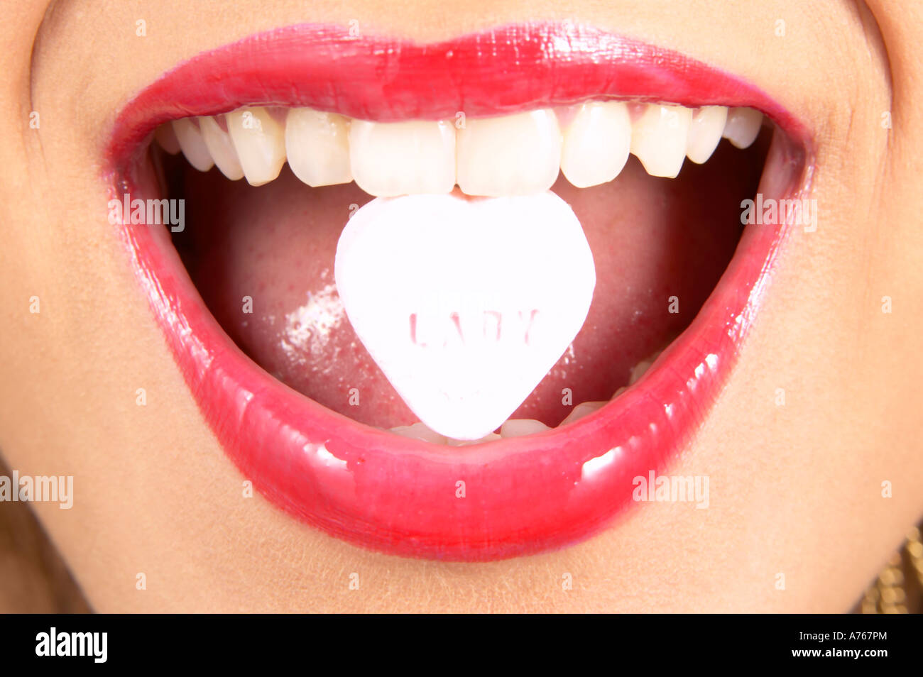 Junge Frau lächelnd, detail Stockfoto