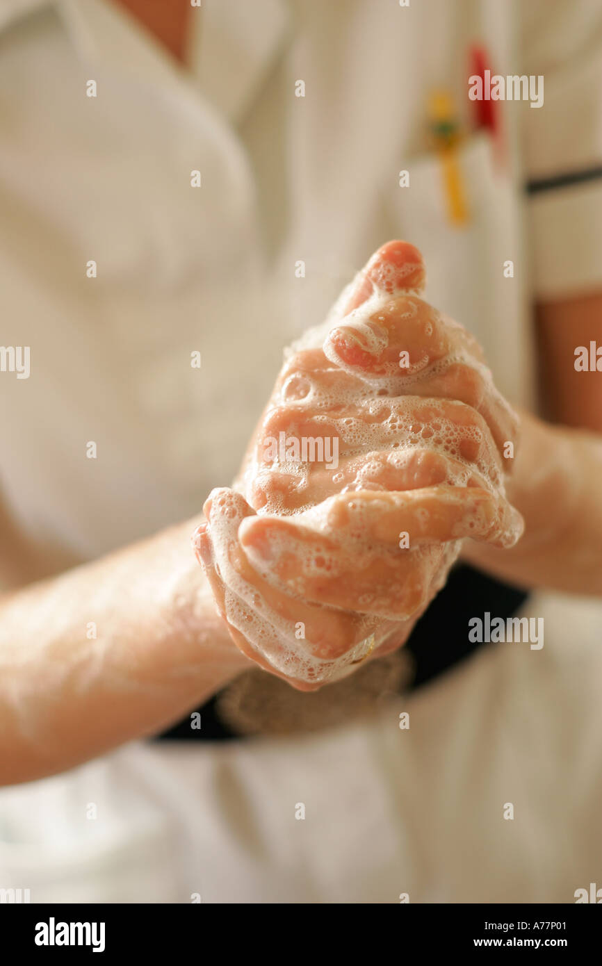 Krankenschwester am Arbeitsstandards der hygiene Stockfoto