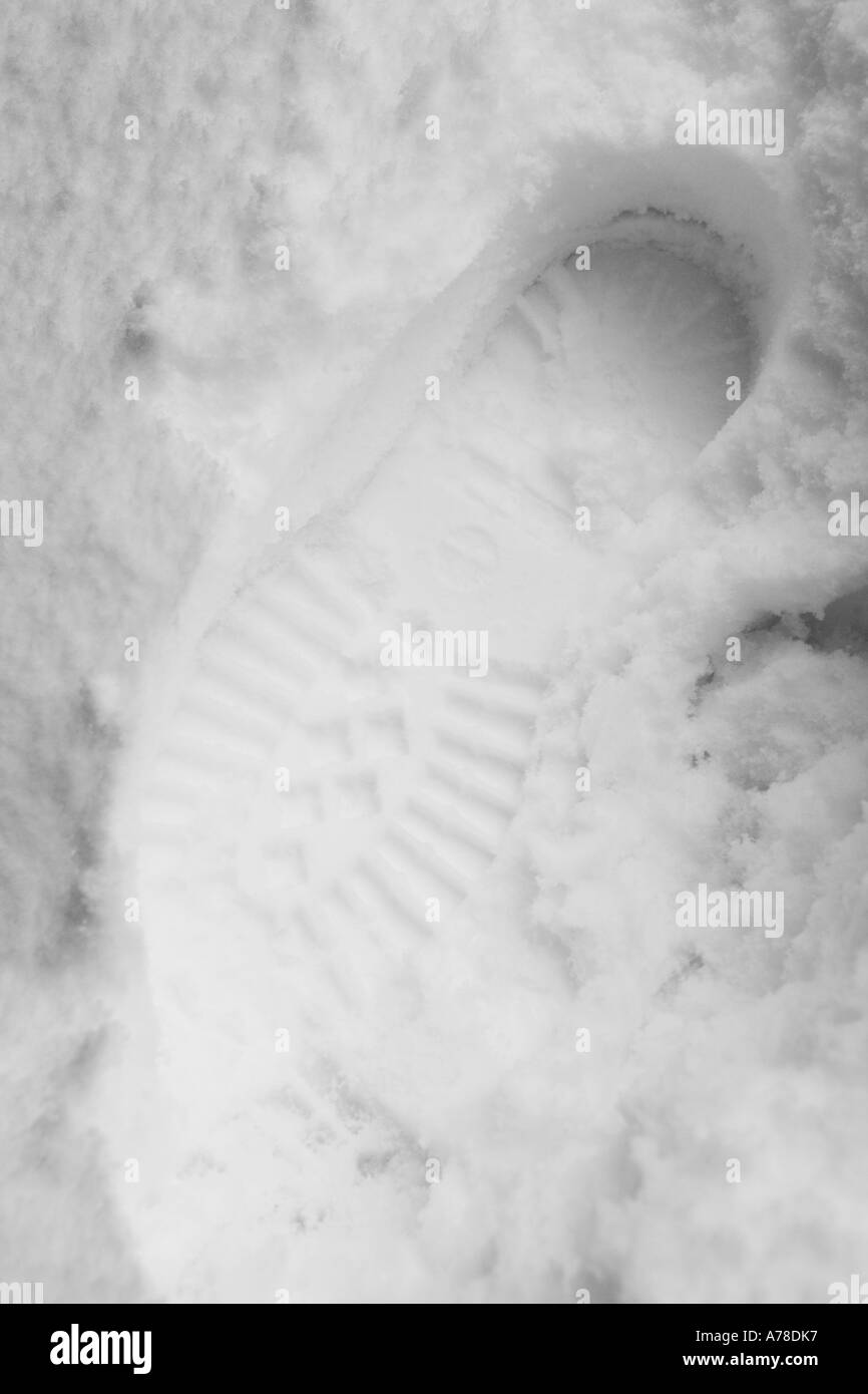 STIEFELABDRUCK IM SCHNEE Stockfoto