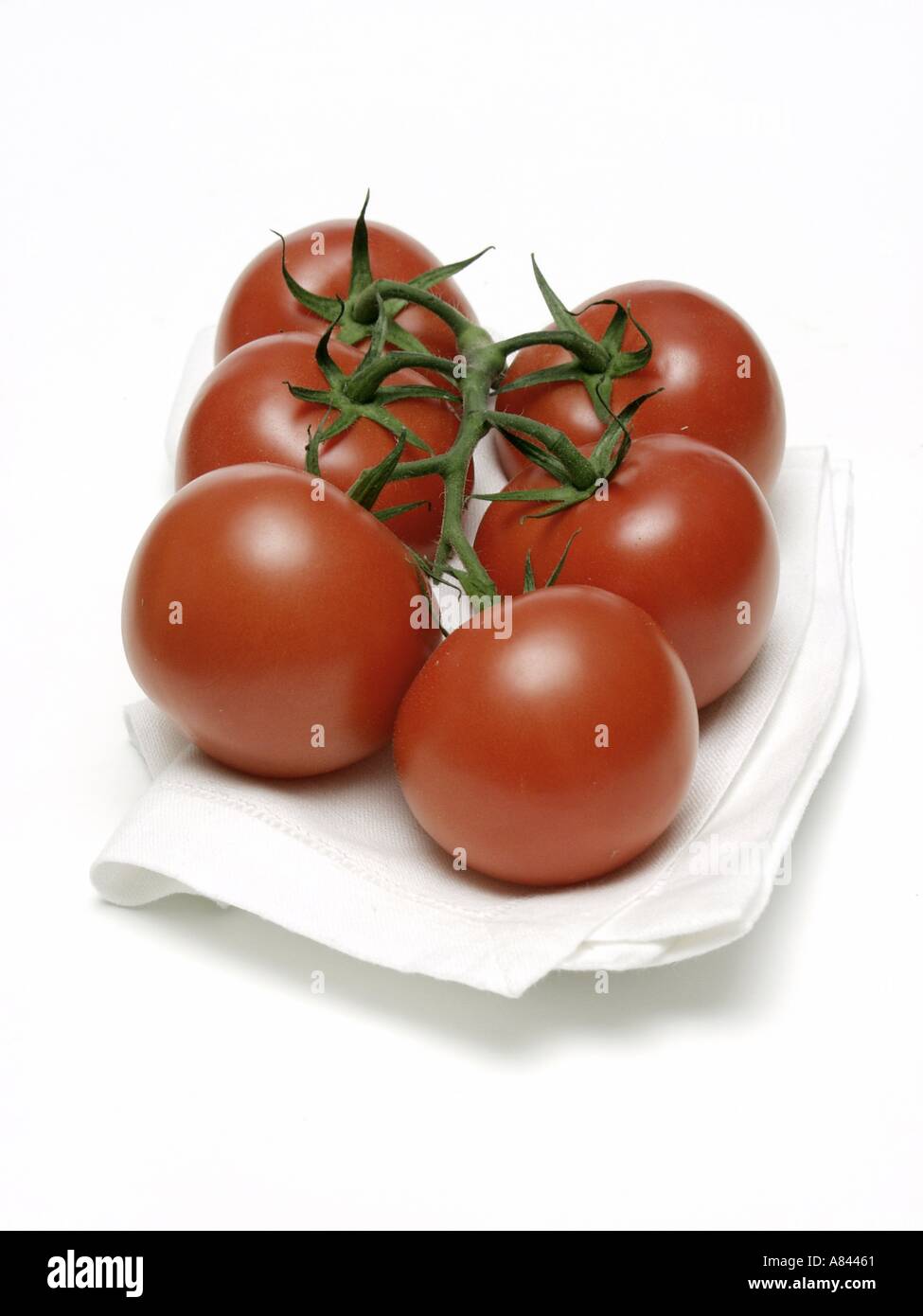 Reben Sie gereifte Tomaten auf Küchenpapier Stockfoto