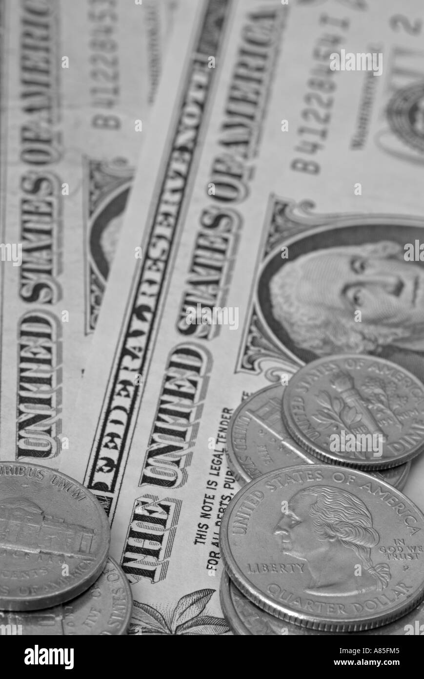 Dollar-Münzen und Banknoten Stockfoto