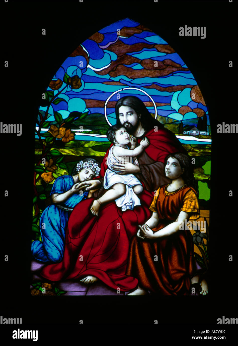 Tiruvalla Kerala Indien St. John's Malankara Syrisch-Katholische Metropolitan Cathedral und Jesus mit Kindern Glasfenster Stockfoto