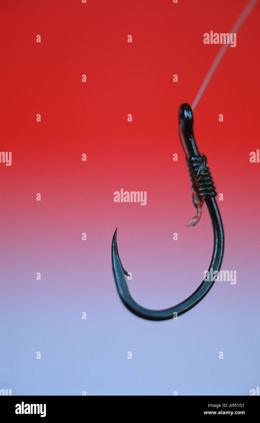 Fischers Haken gebunden mit nylon Stockfoto