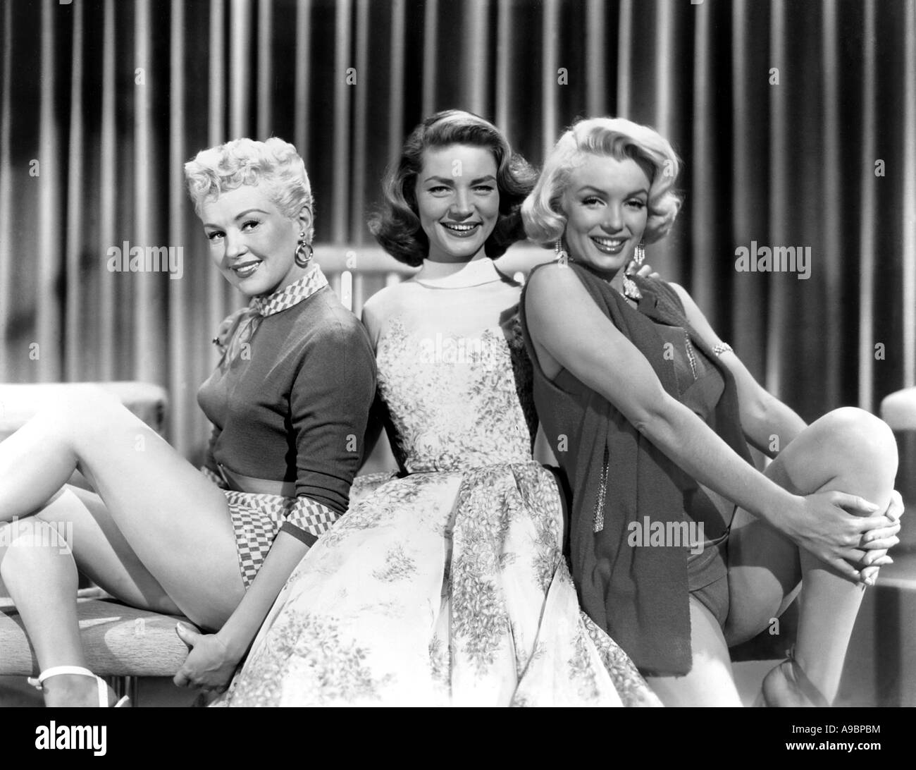 HOW TO MARRY A MILLIONAIRE - 1953 TCF Film mit aus l: Betty Grable, Lauren Bacall und Marilyn Monroe Stockfoto