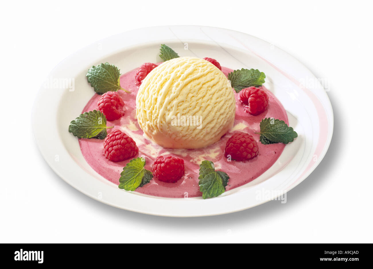 Vanille Eis mit Himbeeren Stockfoto