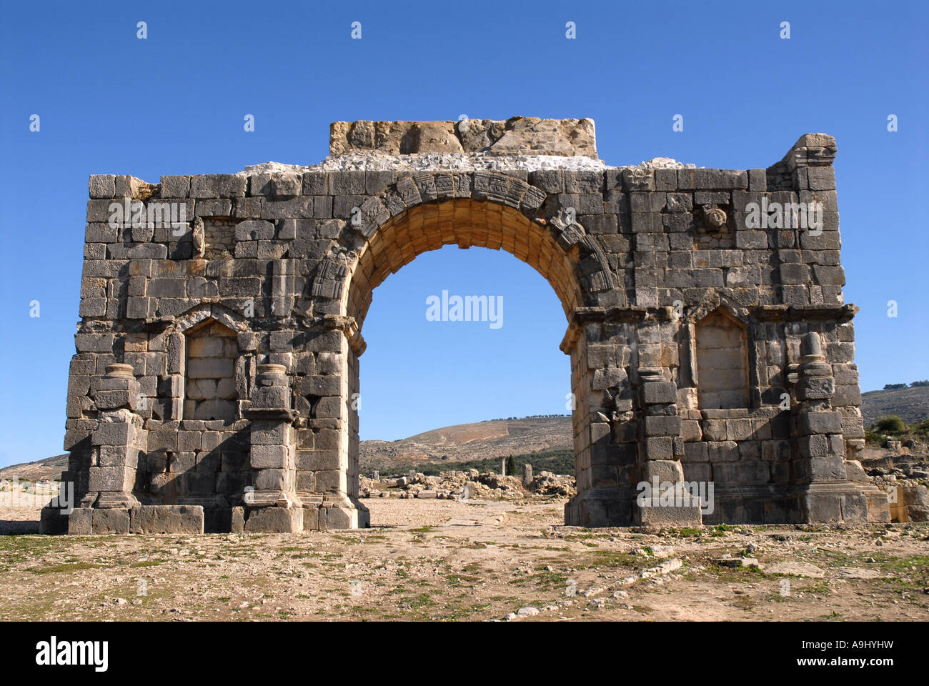 Der Triumphbogen des Caracalla in Volubilis, Marokko, Afrika Stockfoto