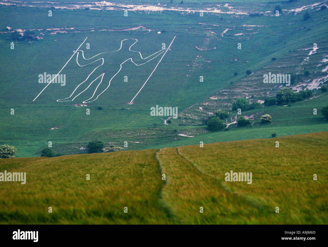 Figur eines Mannes in der Kreide-Hang der South Downs in Wilmington Sussex Südengland Stockfoto