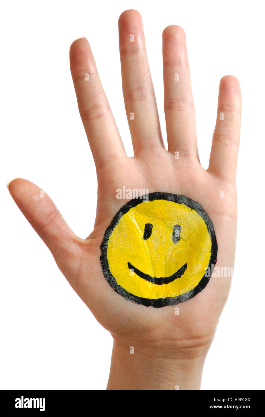 Hand mit einem glücklichen Smiley-Gesicht Stockfoto