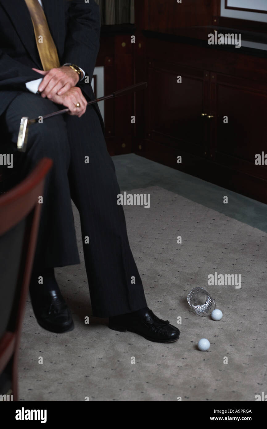 Geschäftsmann üben setzen Stockfoto
