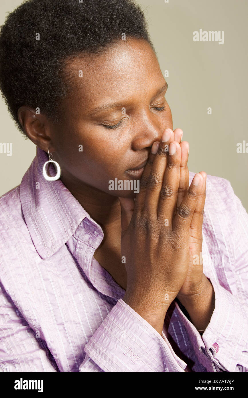 Frau beten Stockfoto