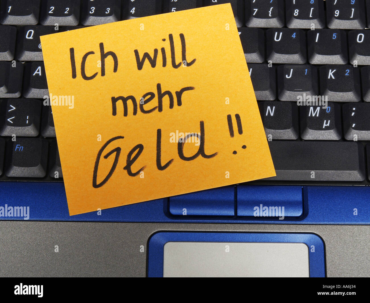 Memo-Hinweis auf Notebook Ich Will Mehr Geld, ich will mehr Geld Stockfoto