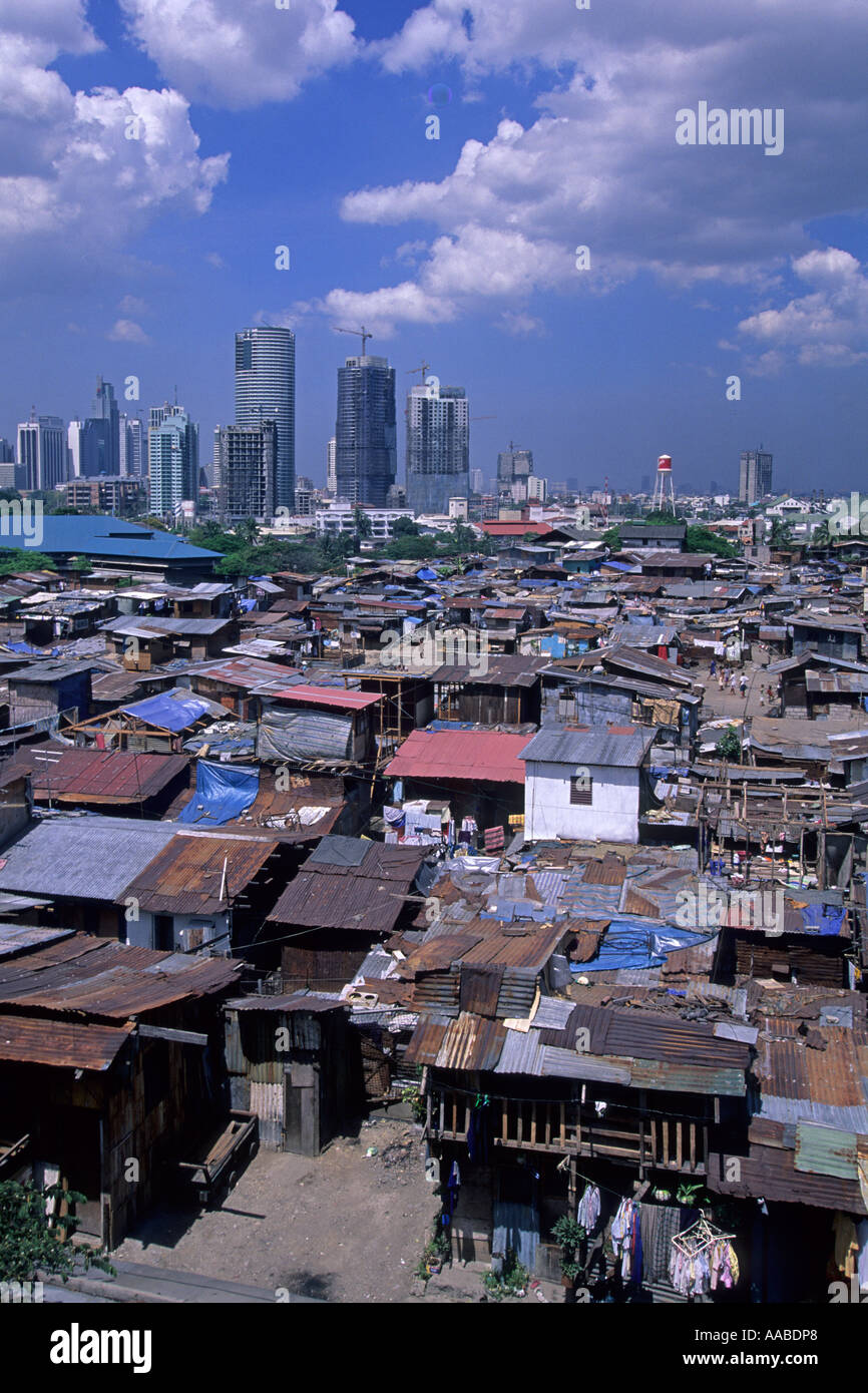 Hochhaus und Hausbesetzer, Manila, Philippinen Stockfoto