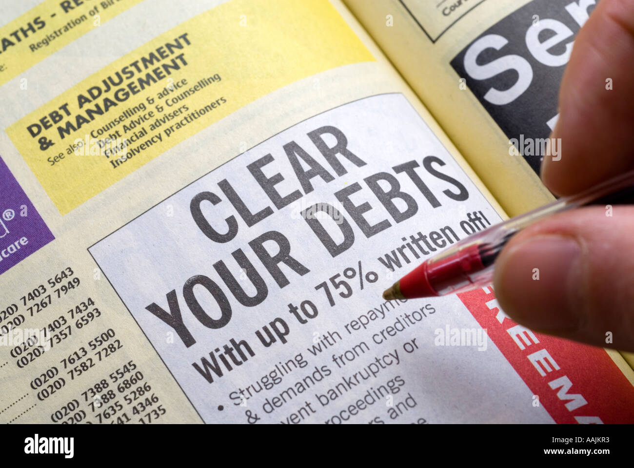 Deaktivieren Sie Ihre Schulden-Werbung im Branchenbuch England UK Stockfoto