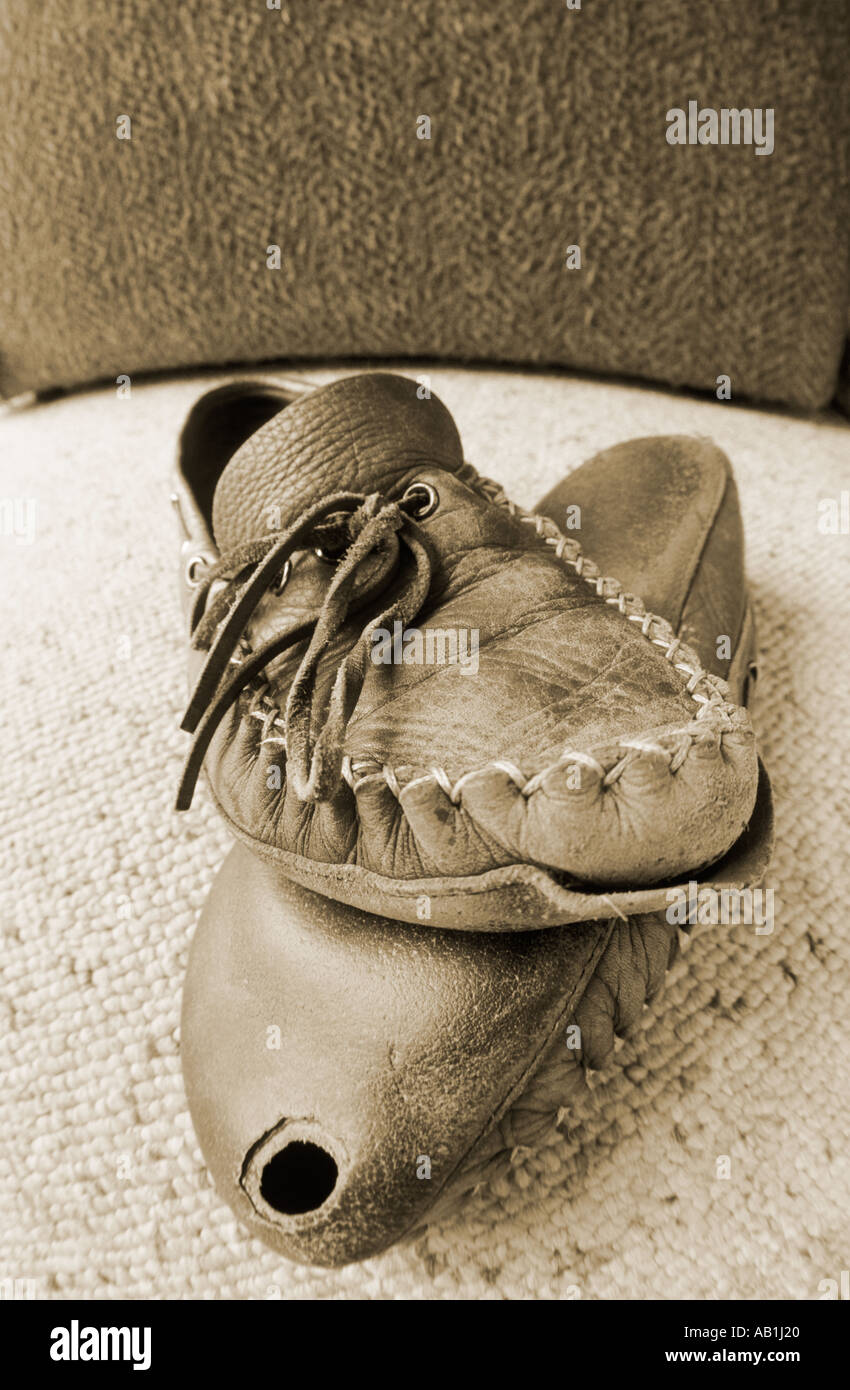 Konzept-Bild von abgenutzten Pantoffeln Stockfoto