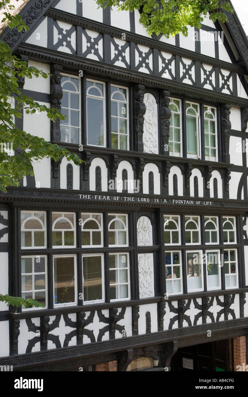 Chester.Row des 17. Jahrhunderts ehemaligen Armenhäuser, bekannt als die neun Häuser im Park Street von Newgate in der historischen Stadtmauer. Stockfoto