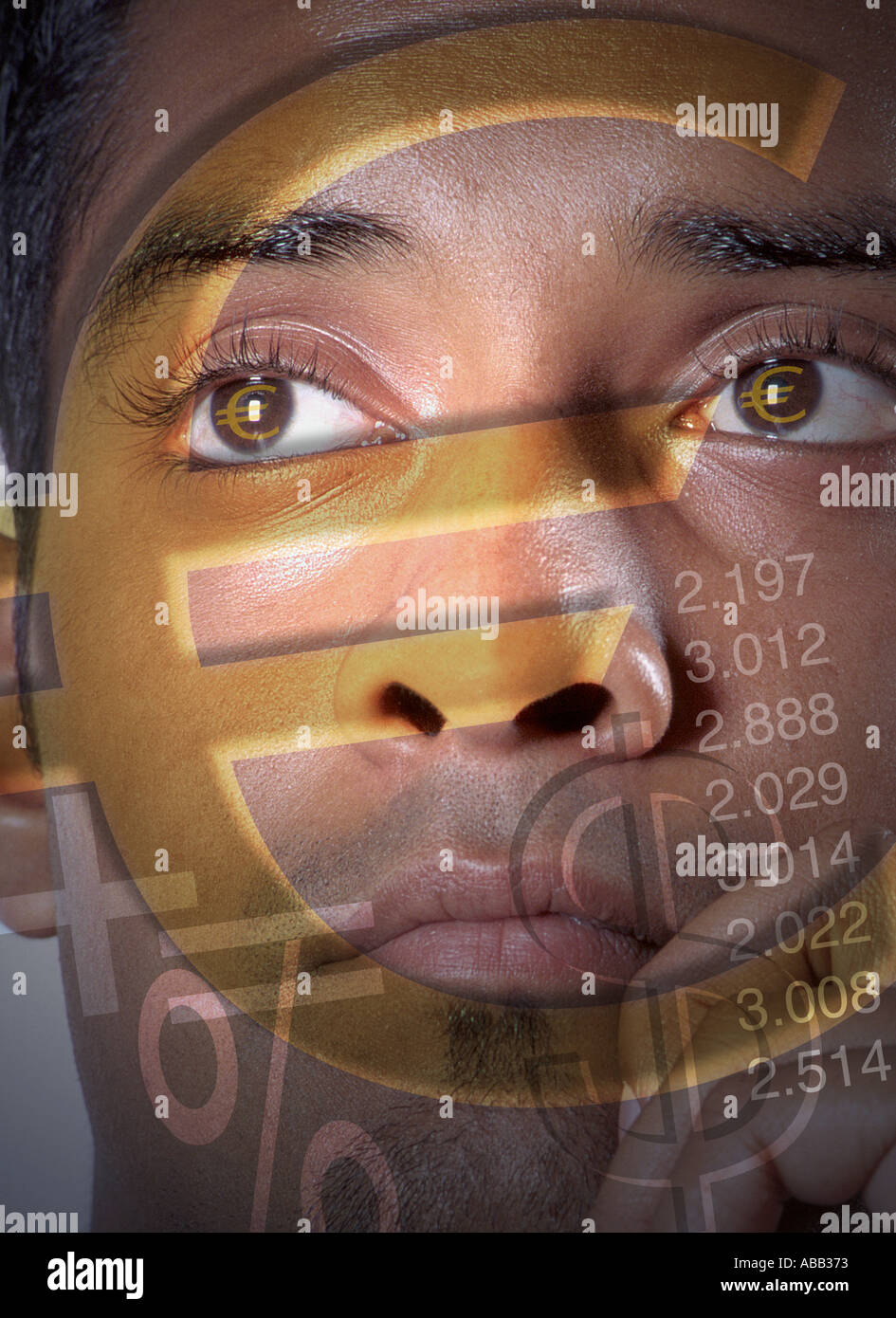 Euro auf ein männliches Gesicht Stockfoto