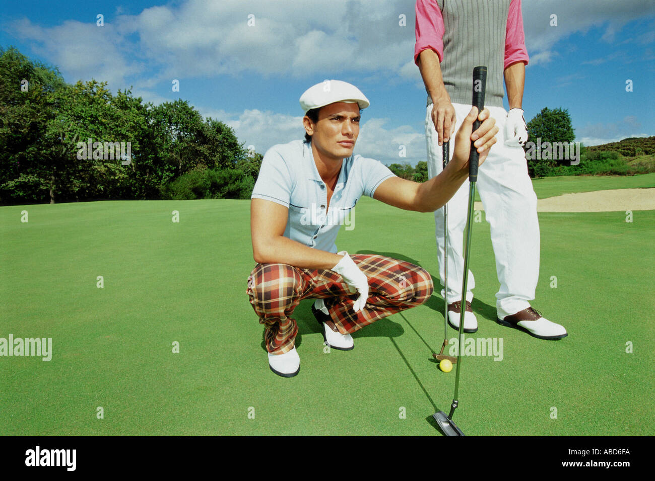 Männer spielen golf Stockfoto