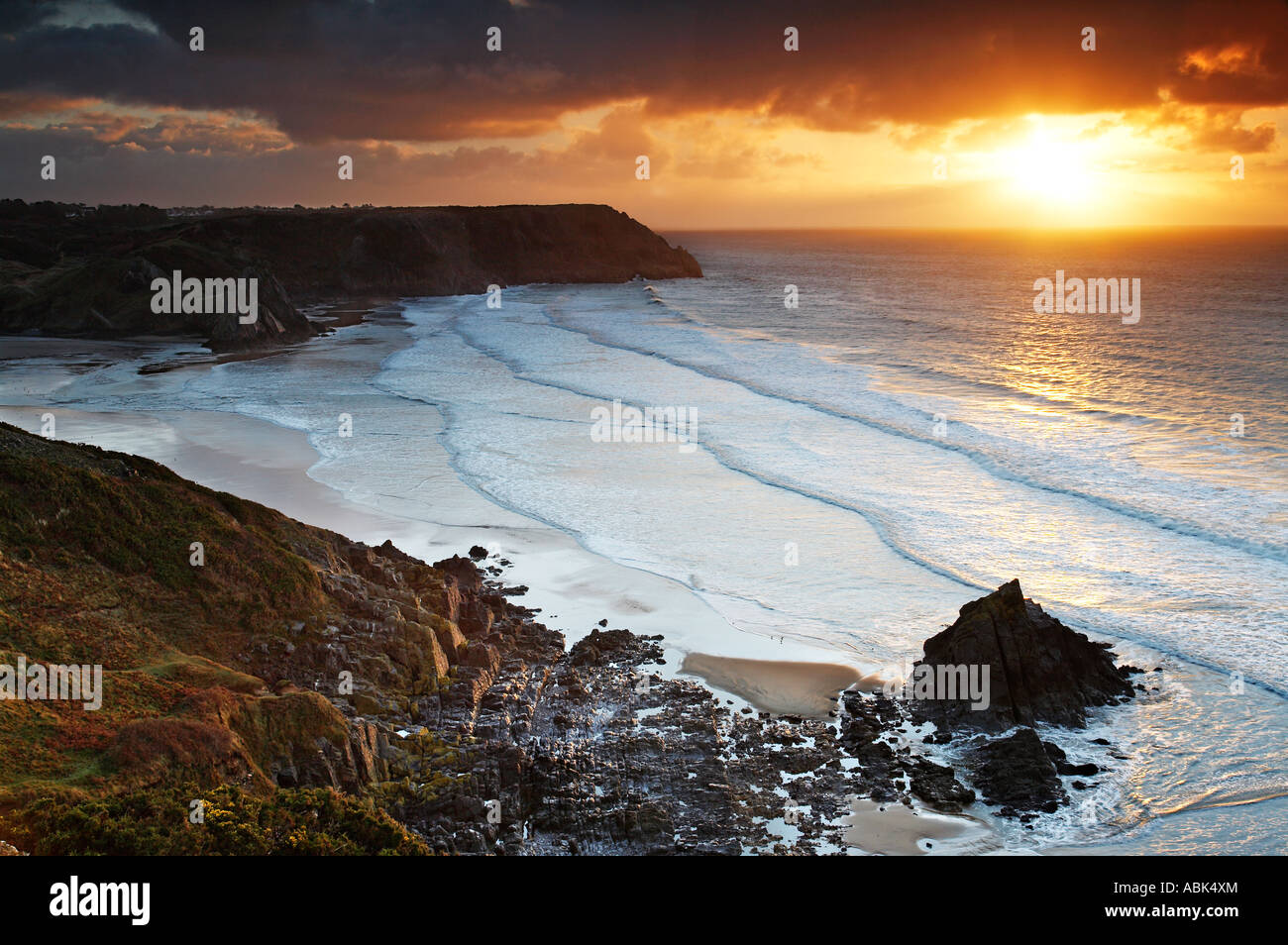 Drei Klippen Bucht am Sunset Gower South Wales UK Stockfoto