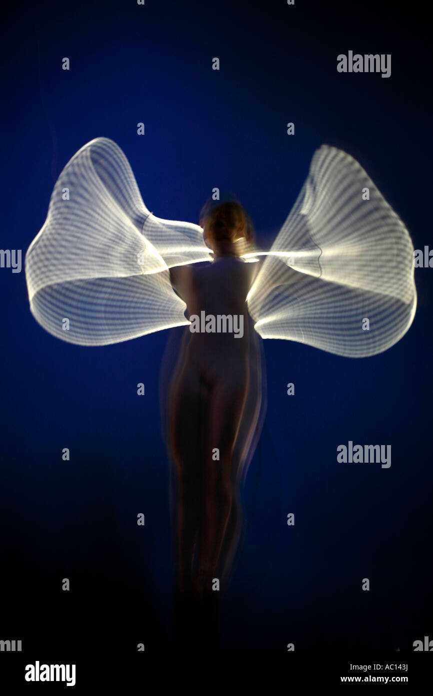 Ein Foto impressionistische Engel mit optischen Faserkabel und Bewegung Stockfoto