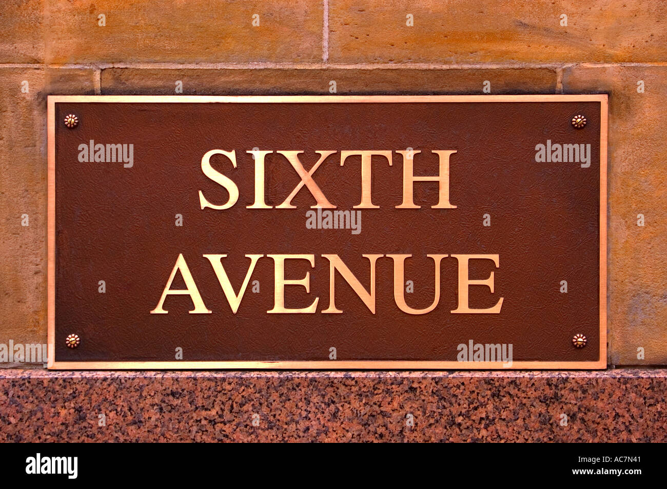 Sixth Avenue Straßenname Eckpfeiler Plaque Stockfoto