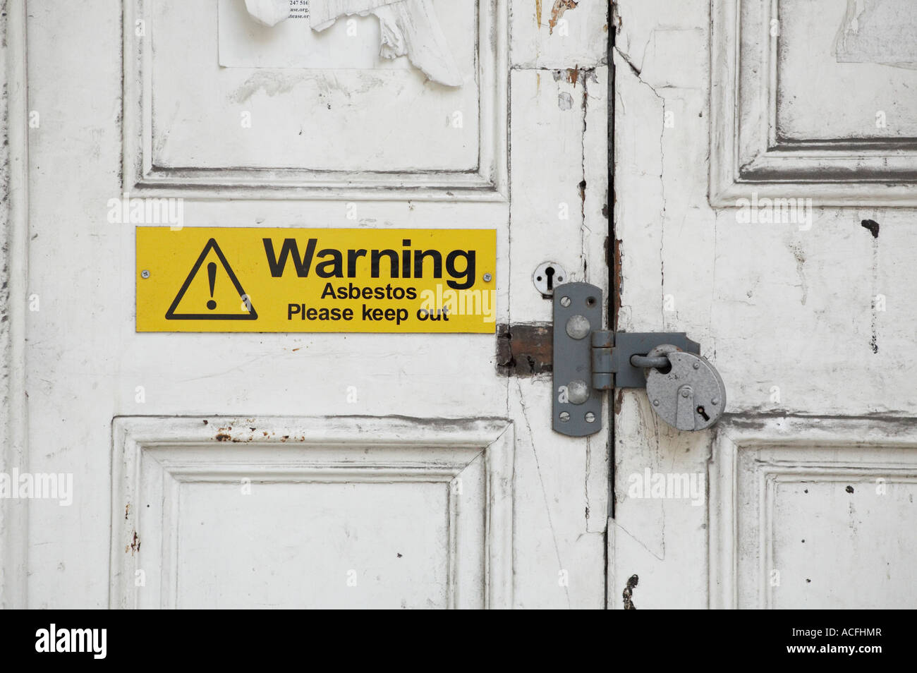 Schild Achtung Asbest Unterhalt aus London UK Stockfoto