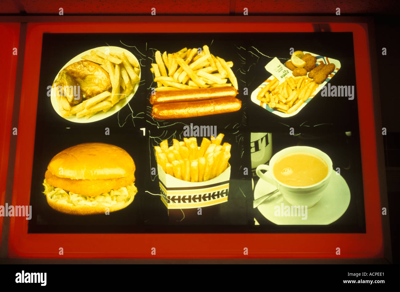 Nonverbale Kommunikation Bildzeichen Sprache. Fast Food Neon-Werbung Schild London UK . 2000er HOMER SYKES Stockfoto
