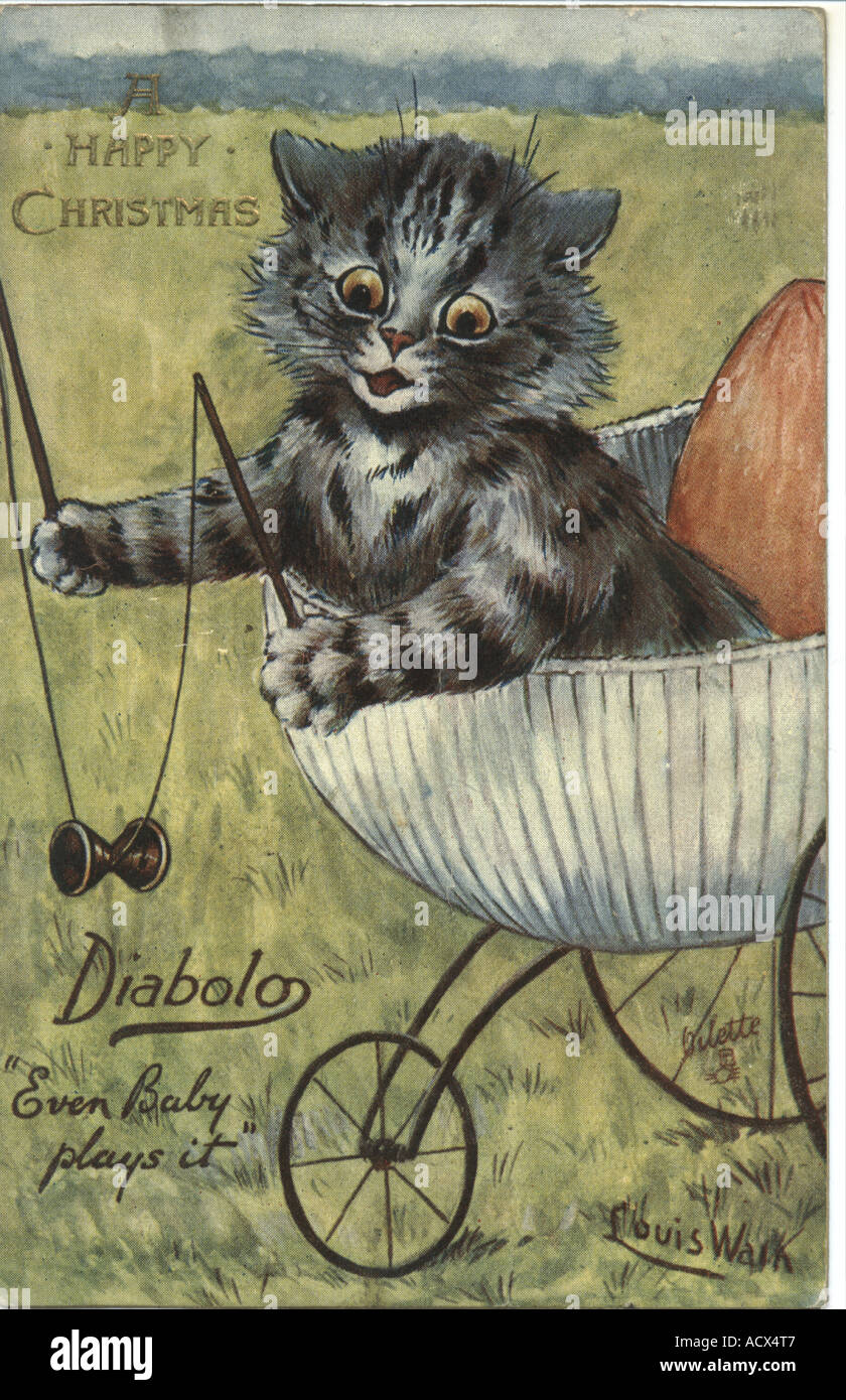 Weihnachten Gruß Postkarte Kätzchen spielen Diabolo von Louis Wain circa 1905 Stockfoto