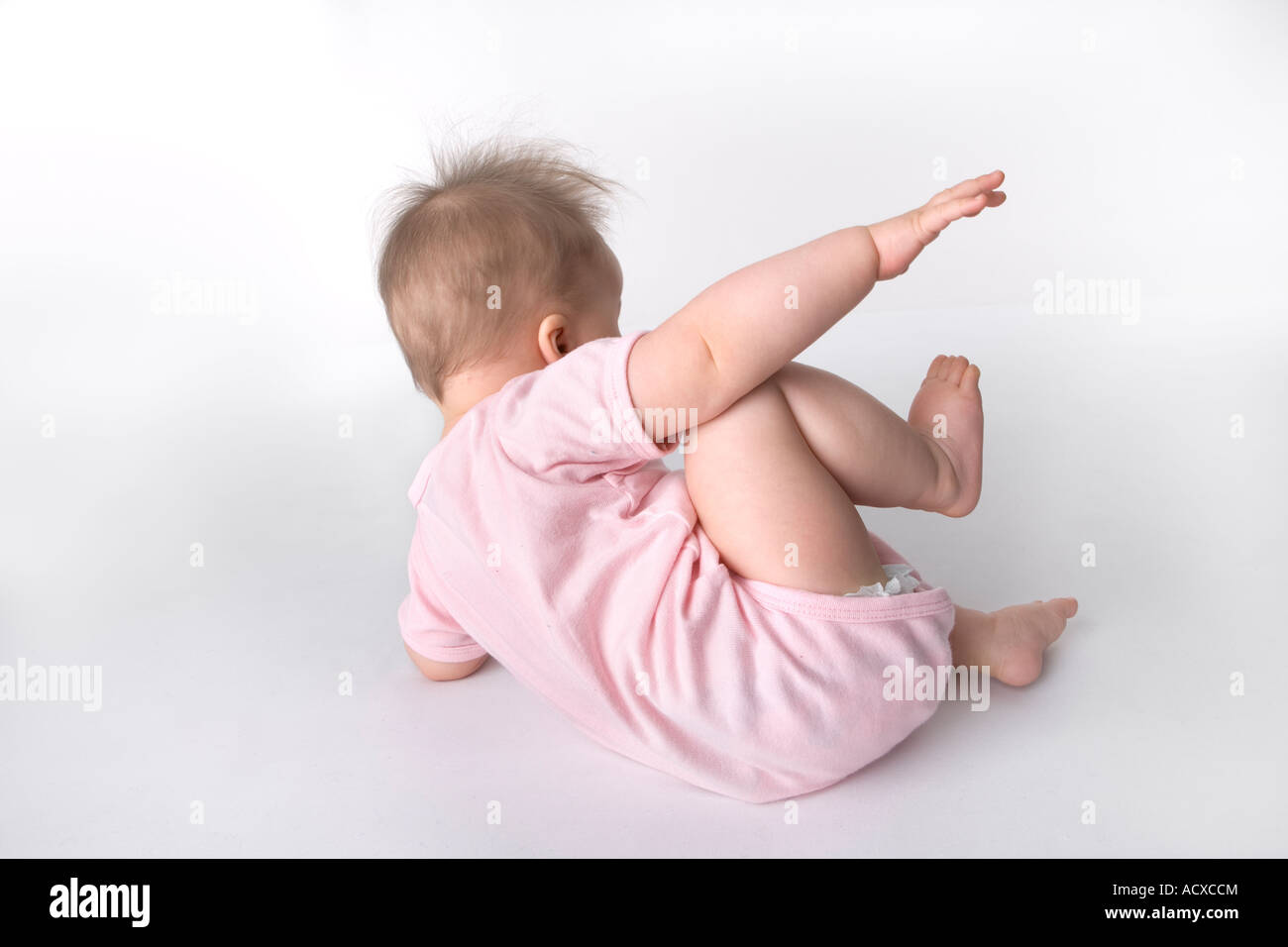 Baby fällt auf den Boden Stockfoto