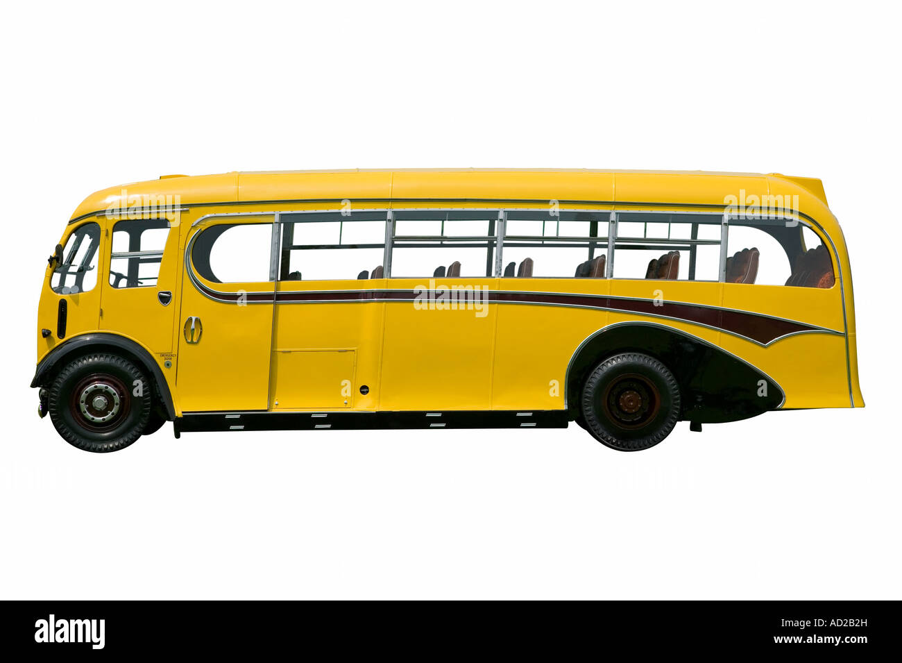 Vintage gelb Schulbus isoliert auf weiss mit Beschneidungspfad Stockfoto