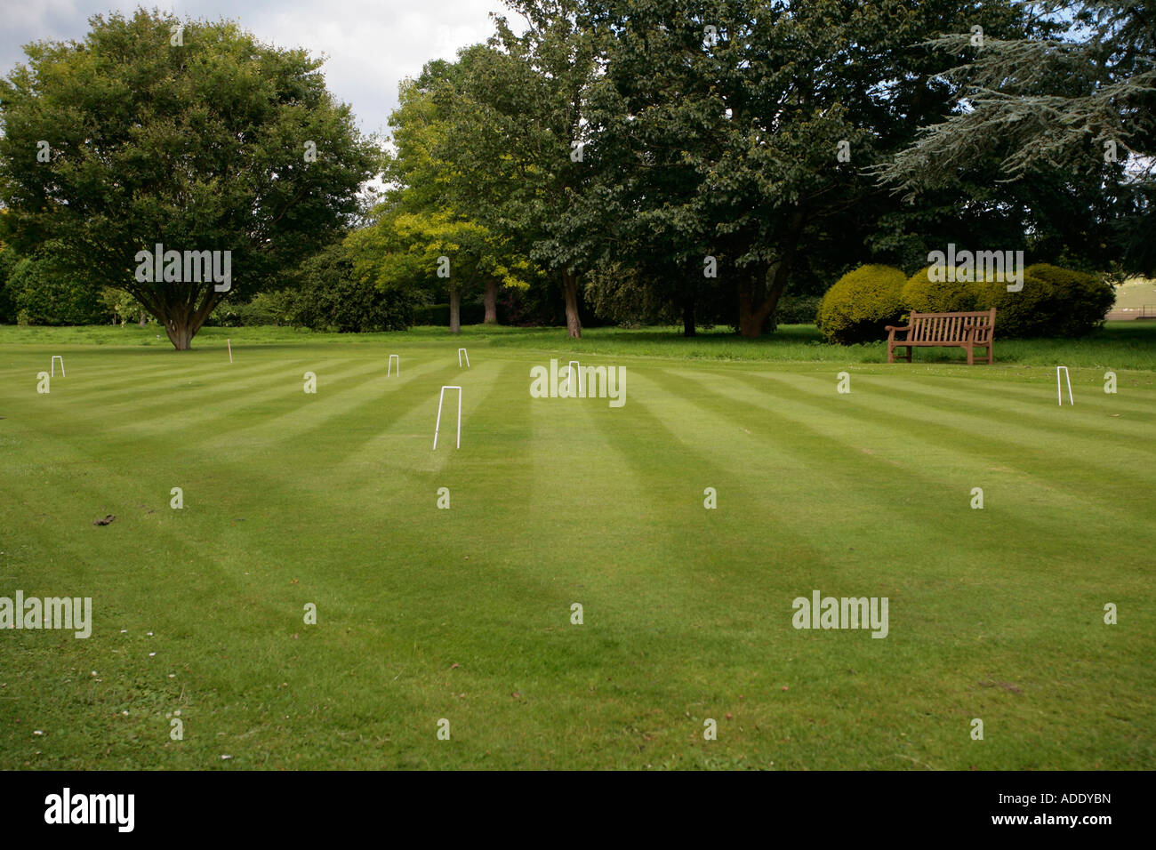 English Croquet Lawn in West Dean Gardens, West Sussex, England, Großbritannien Stockfoto