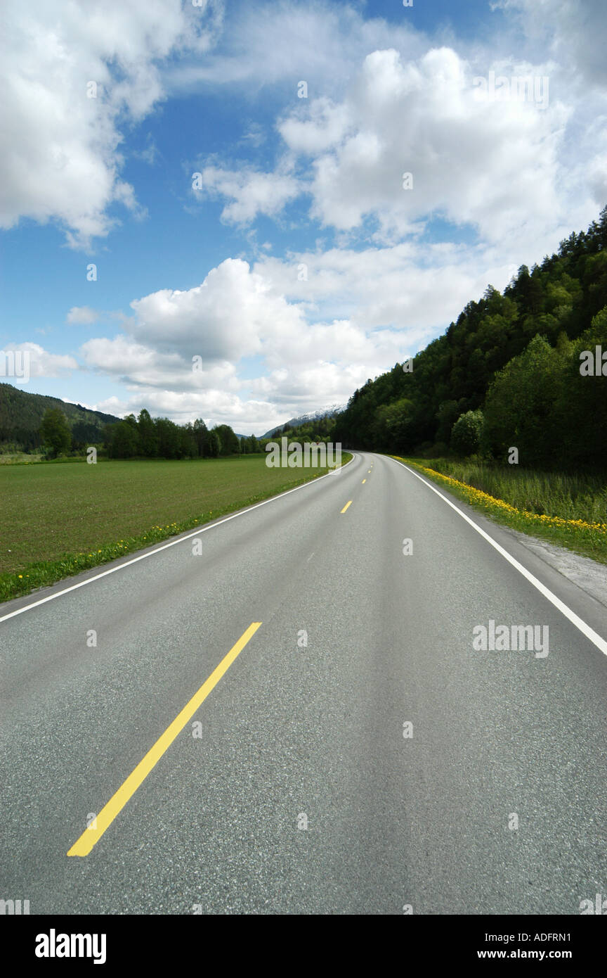 Empty road stretching into the distance in Surnadal Norway. Stockfoto