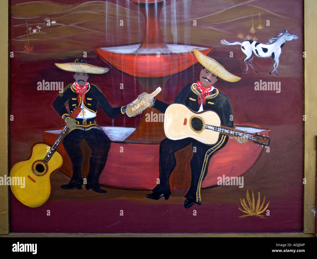 "Wandbild der mexikanischen Gitarristen einer Flasche Agave, das Destillat der"Agave"California" Stockfoto