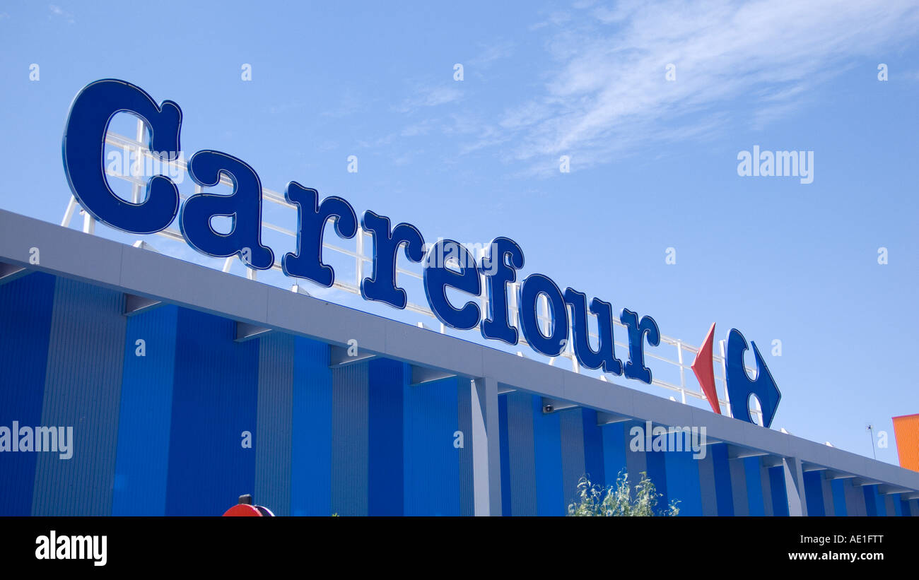 Supermarkt Carrefour Signage auf ein Geschäft in Granada, Spanien Stockfoto