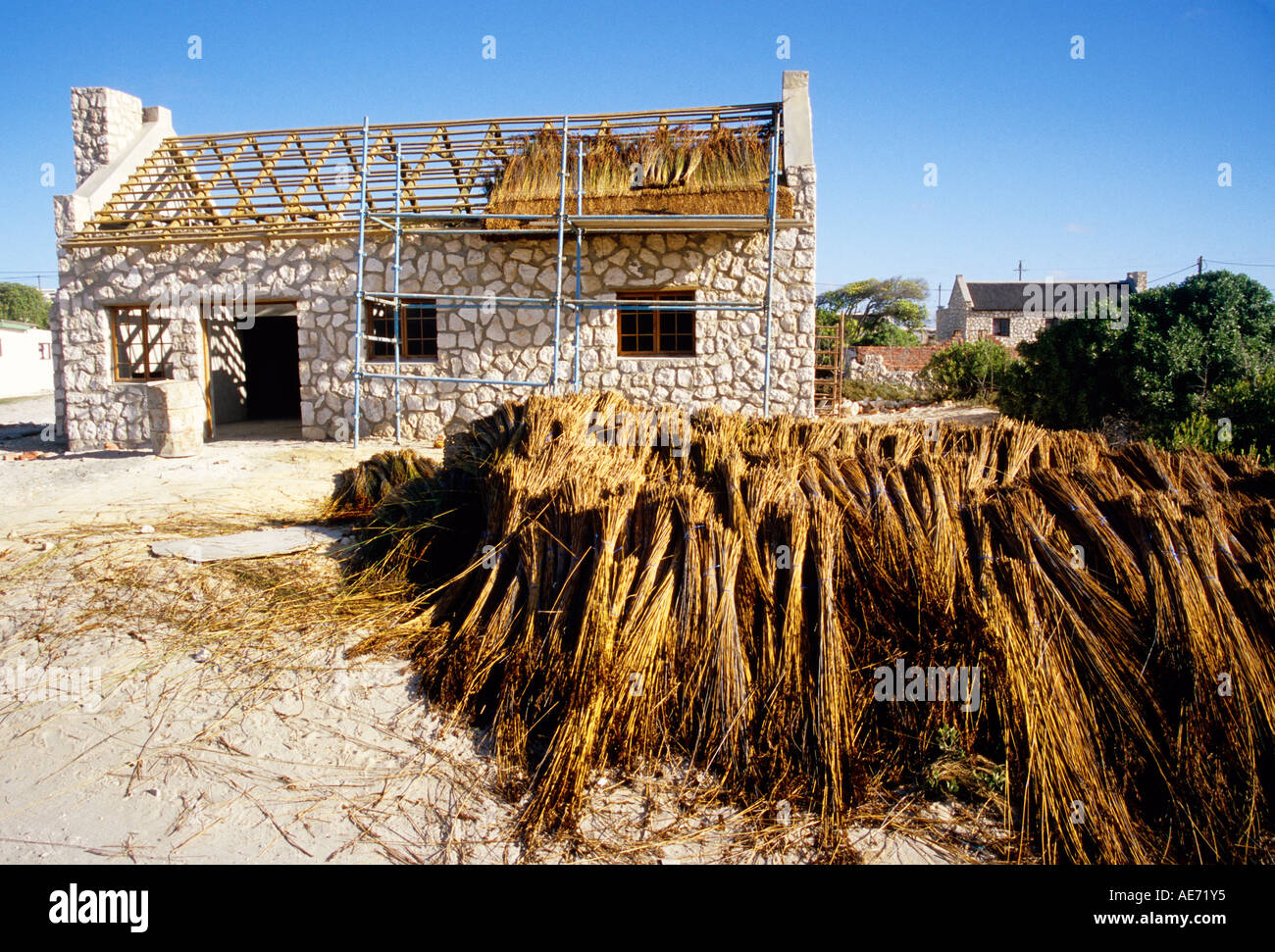 Thatching Dach Stein Fishermans Cottage in Arniston, Western Cape, Südafrika Stockfoto