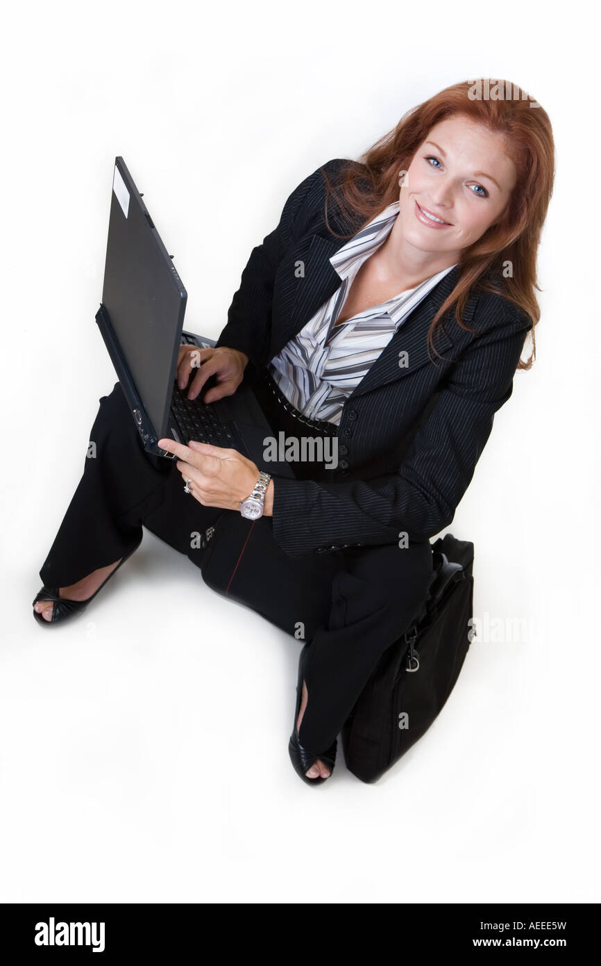 Vielbeschäftigte Geschäftsfrau Stockfoto