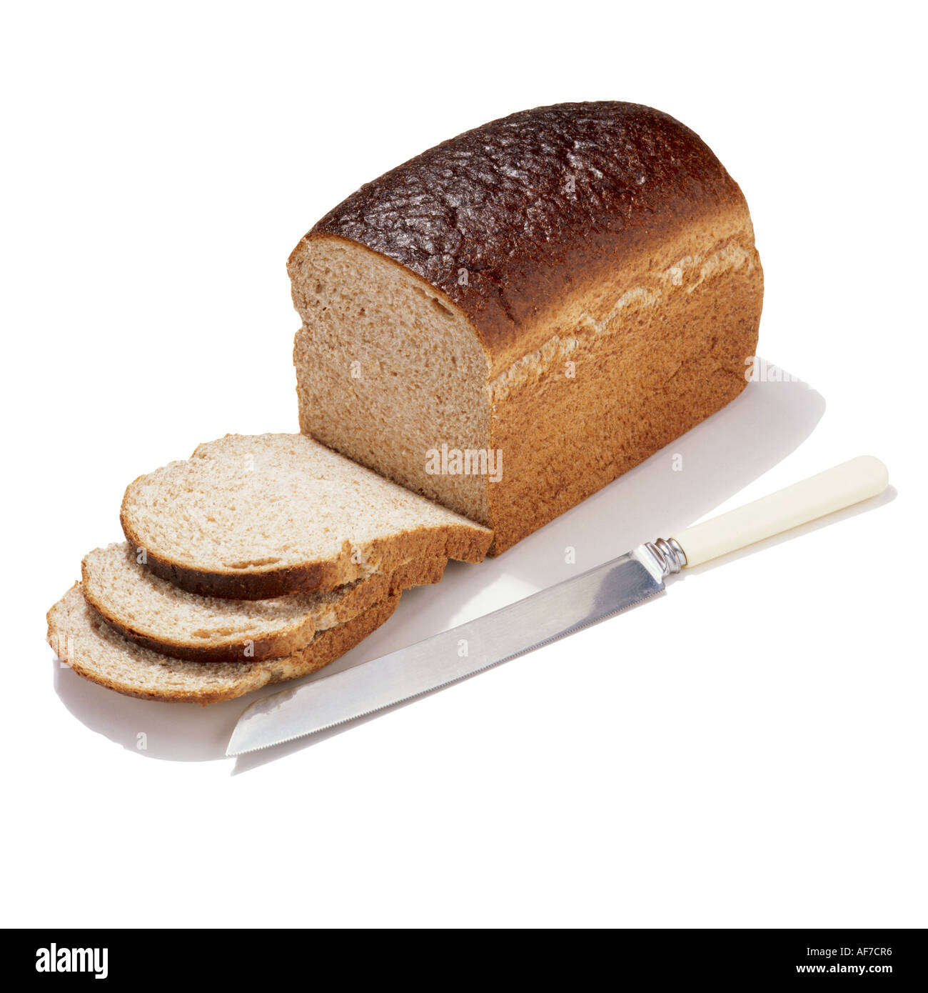 Ein Laib Brot und Brotmesser Stockfoto