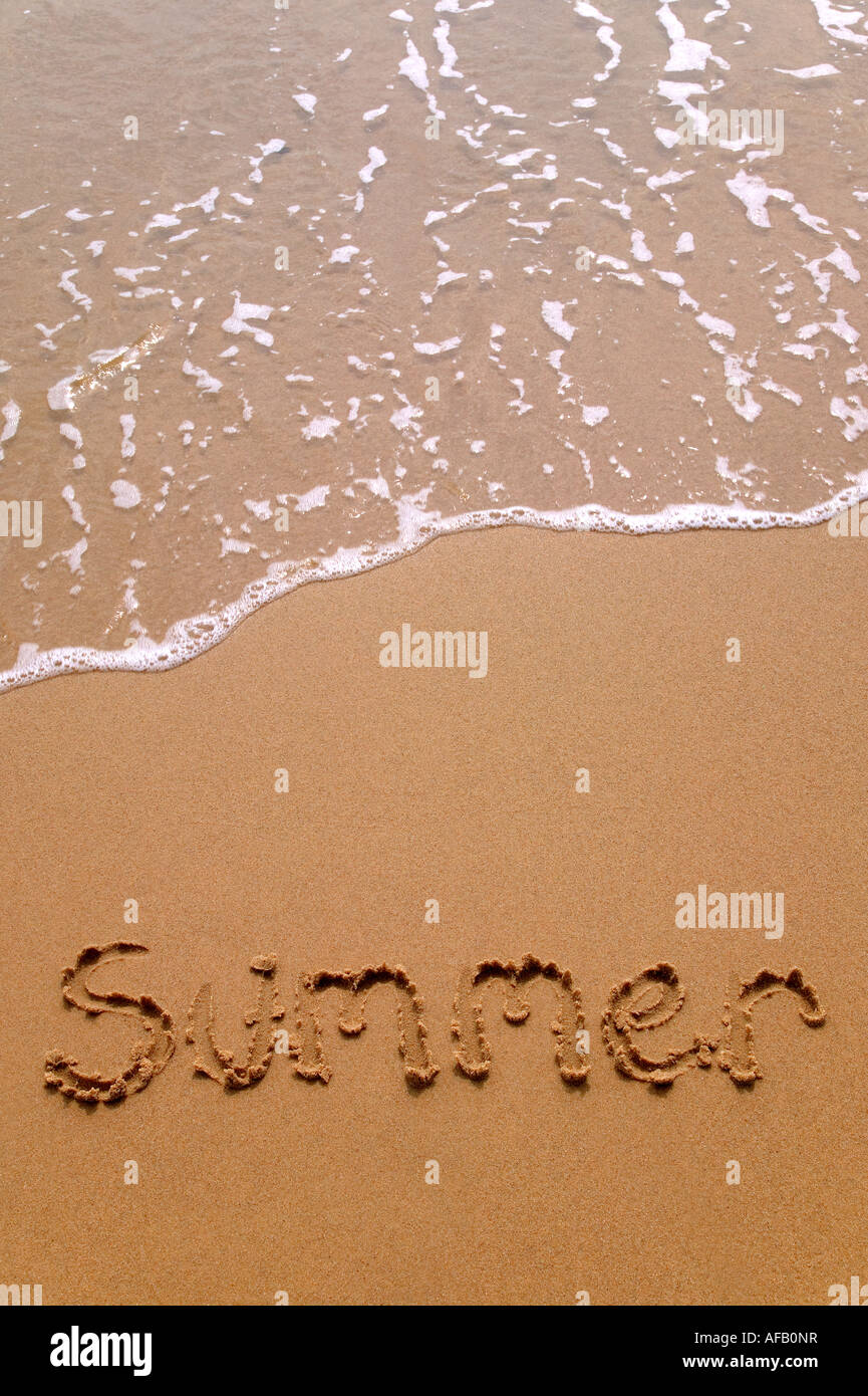 Sommer im Sand am Strand geschrieben Stockfoto