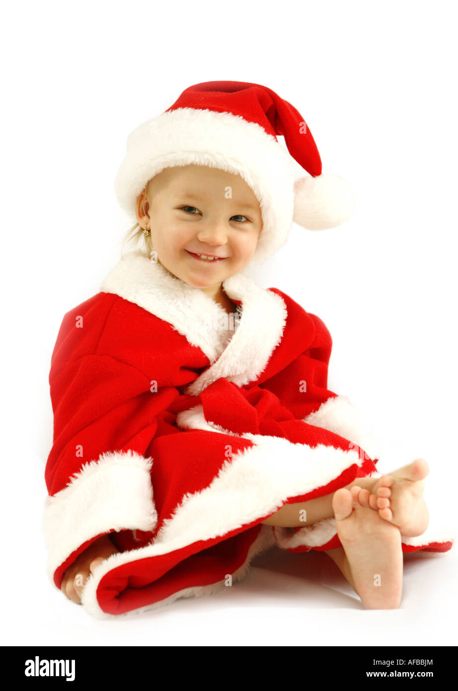 Ein kleines Mädchen als Santa Claus Porträt auf weiß Stockfoto