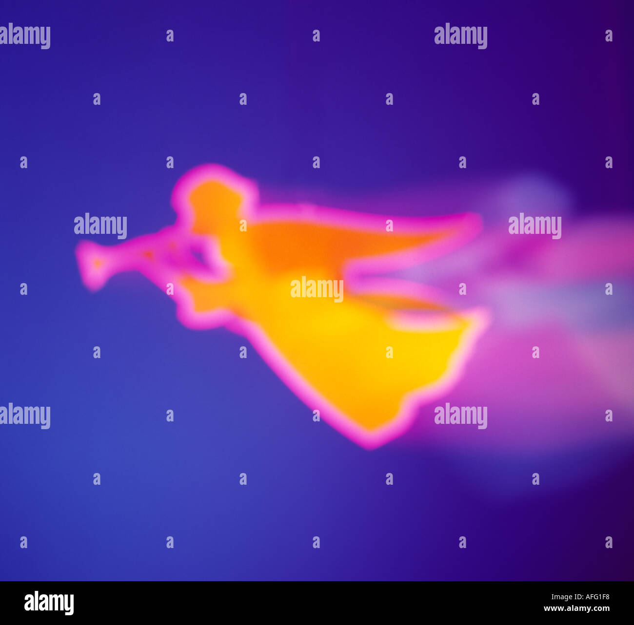 Flying angel with trumpet Fotos und Bildmaterial in hoher Auflösung