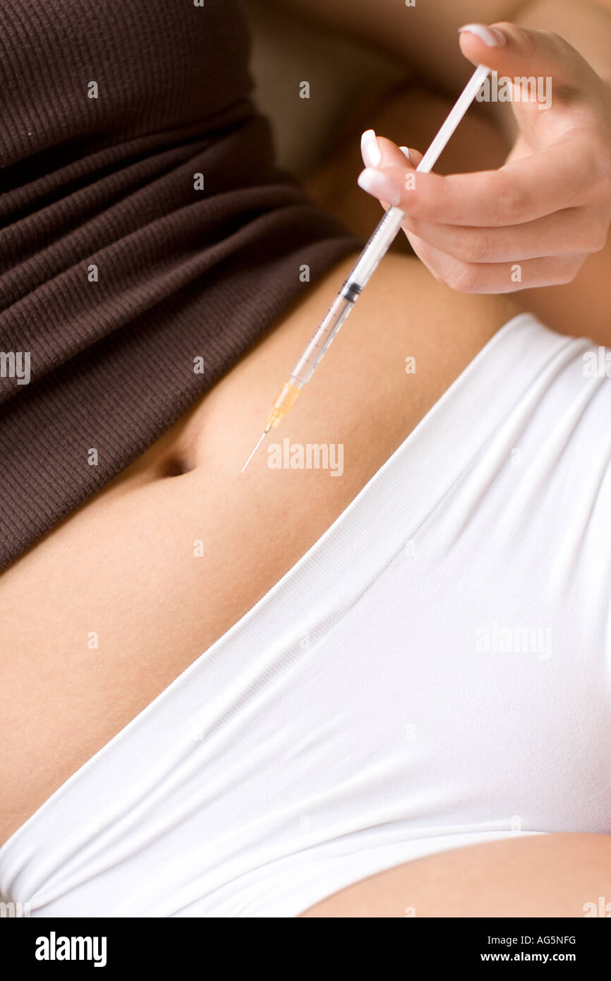 Frau Insulininjektion verwenden Stockfoto