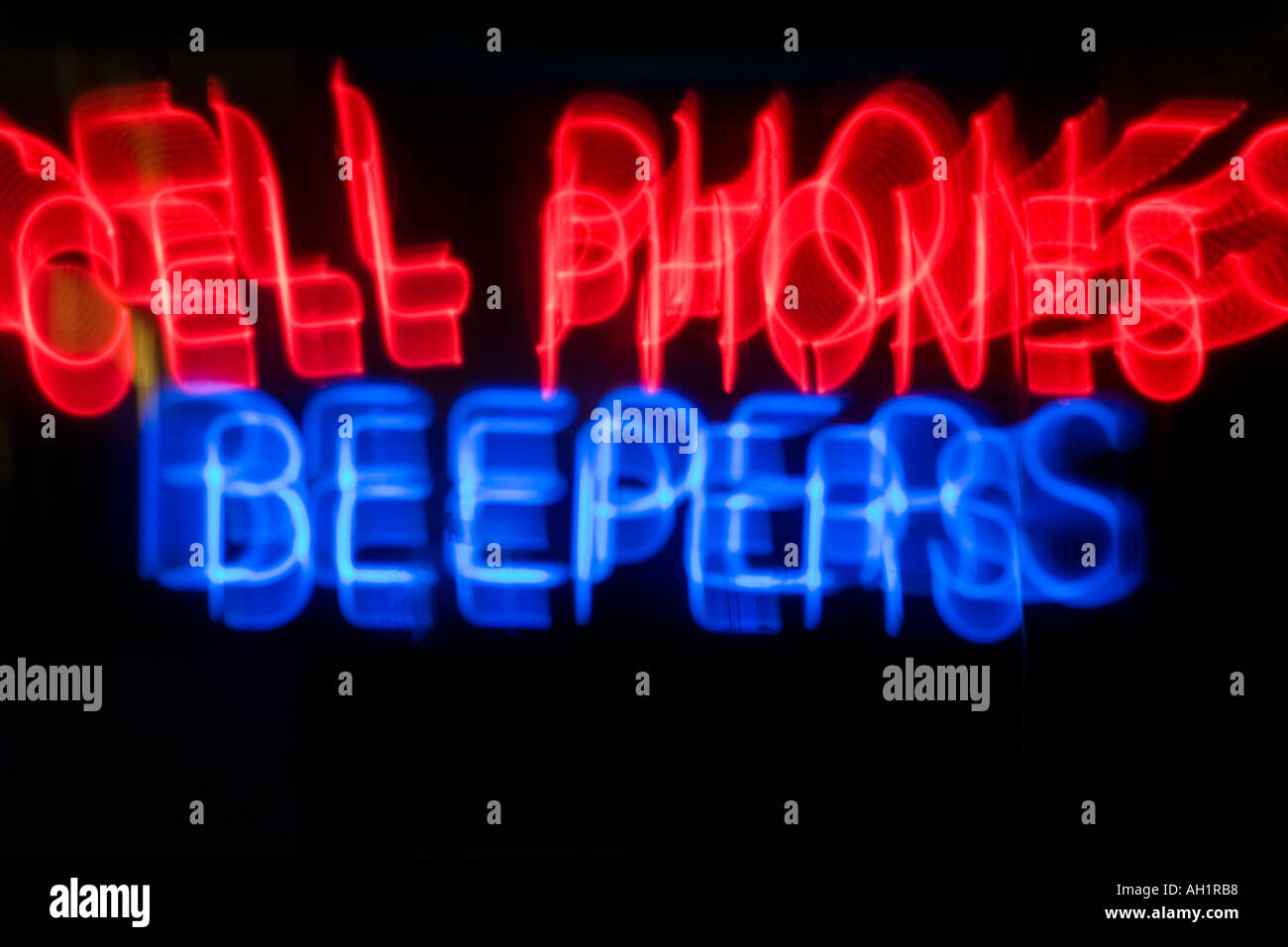 Neon rot und blau Handys und Signalgeber Stockfoto