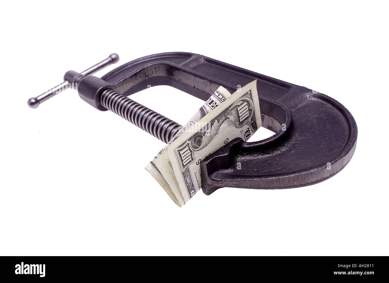 hundert-Dollar-Note in eine C-Clamp Silhouette auf weißem Hintergrund Stockfoto