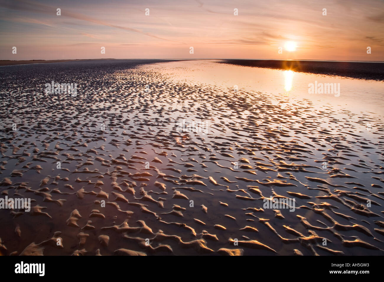 Sunset Brancaster Beach, Norfolk, Großbritannien Stockfoto