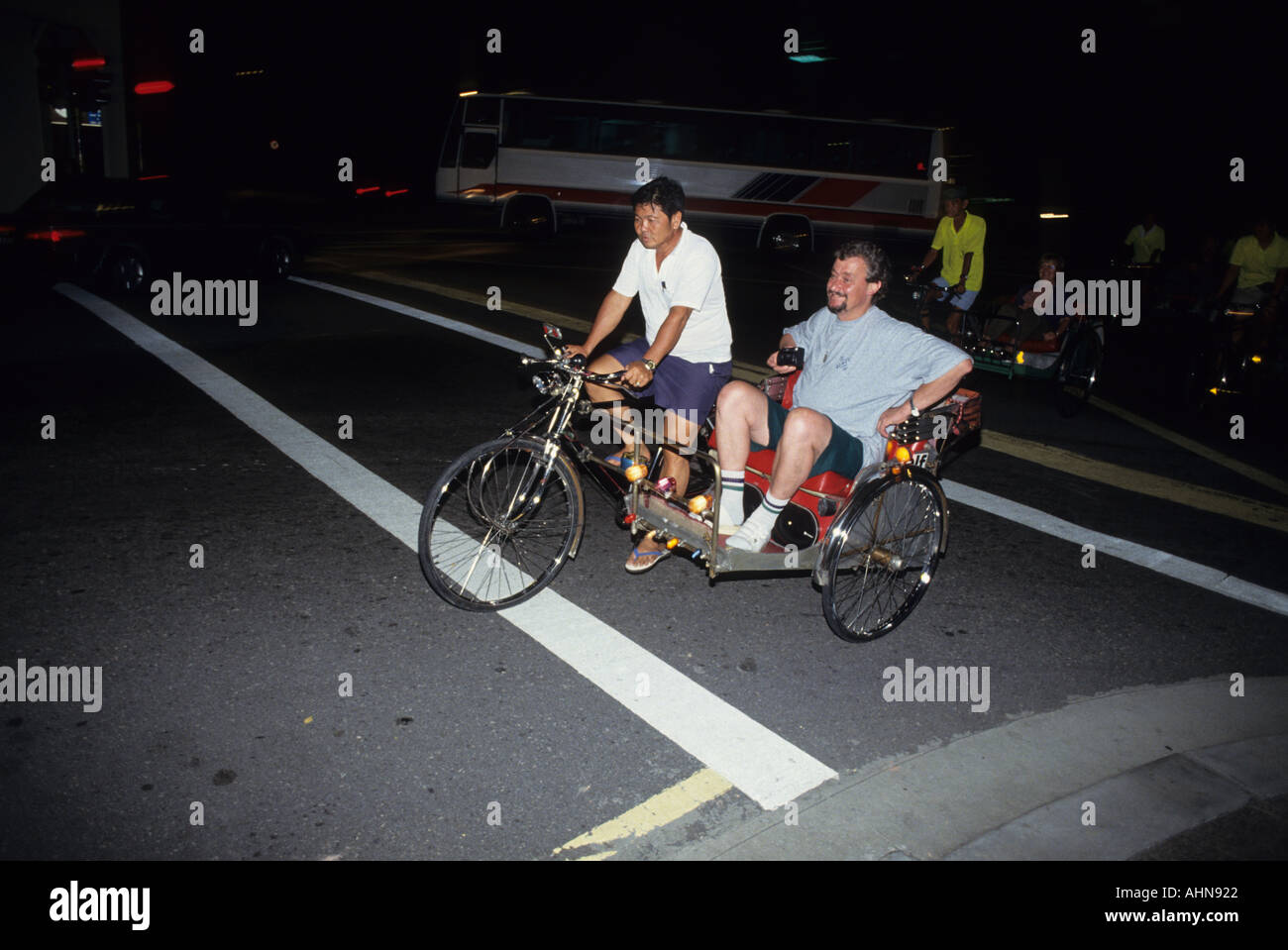 Rikscha ein Dreirad-Rikscha mit touristischen Passagier North Bridge Road-Singapur Stockfoto