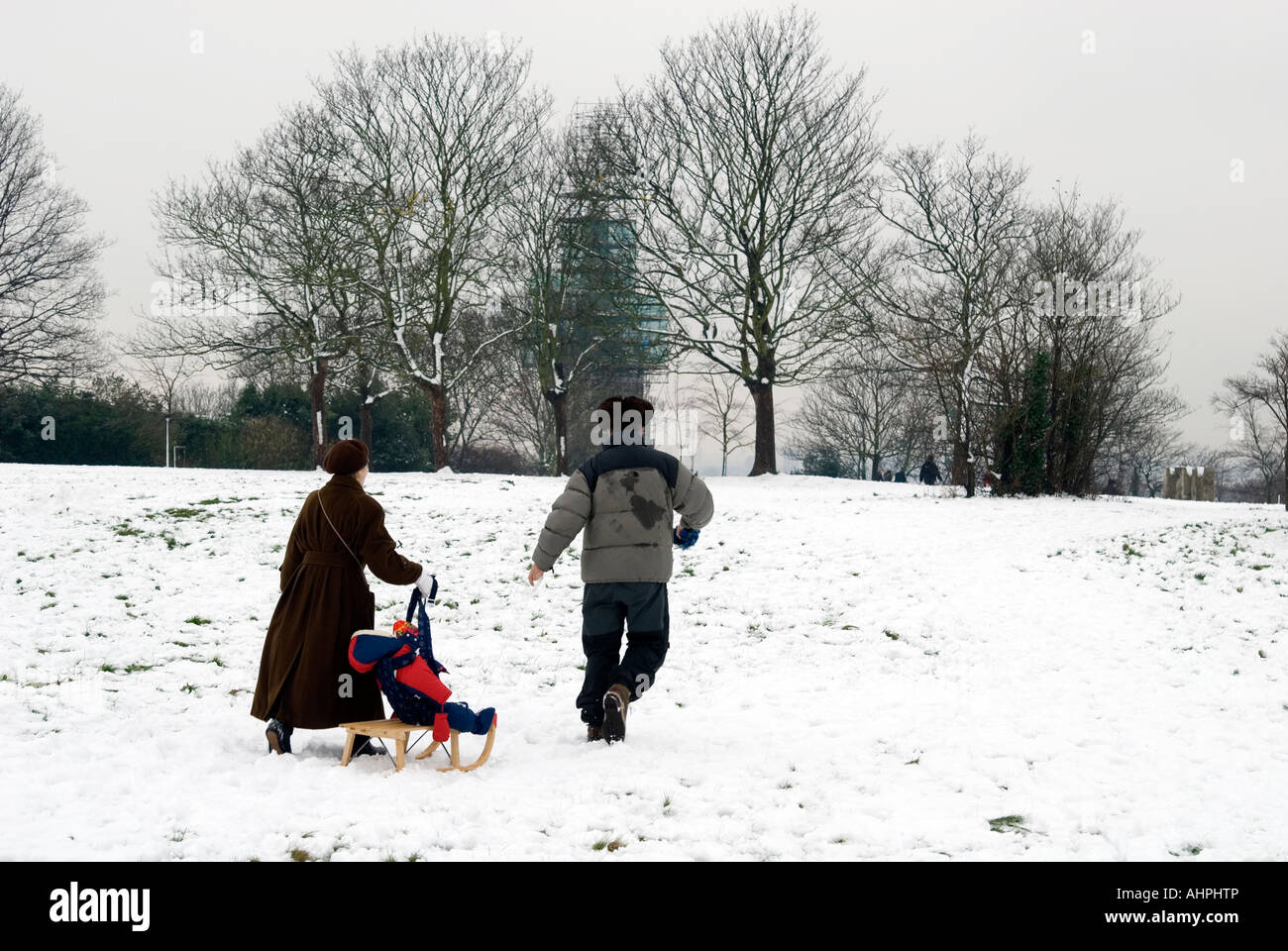 Familie Rodeln in Greenwich Park London Stockfoto