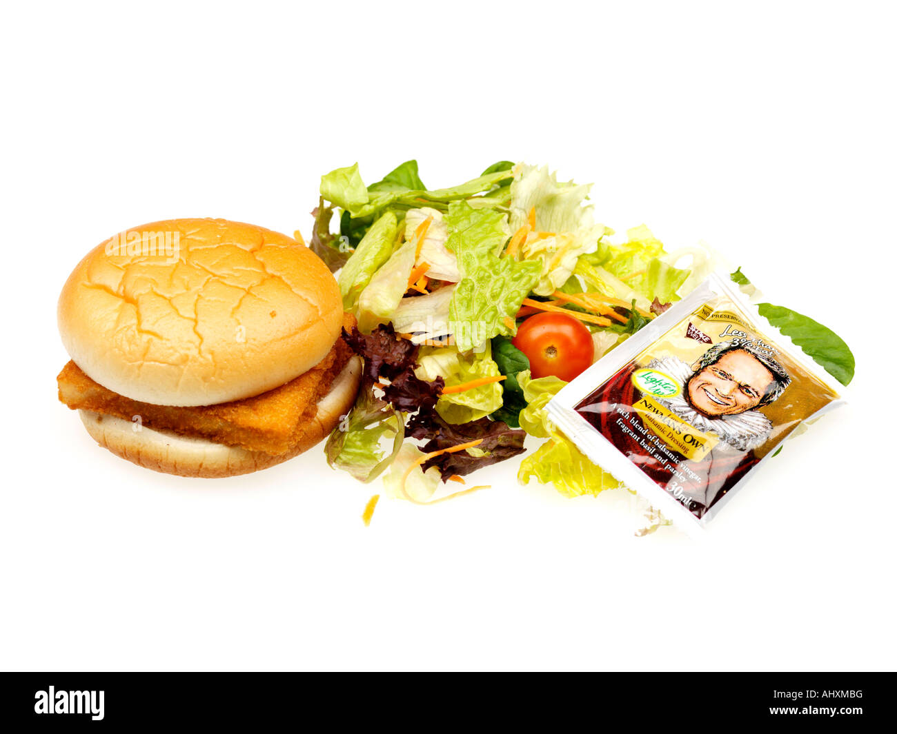 Fisch-Burger und Salat Stockfoto