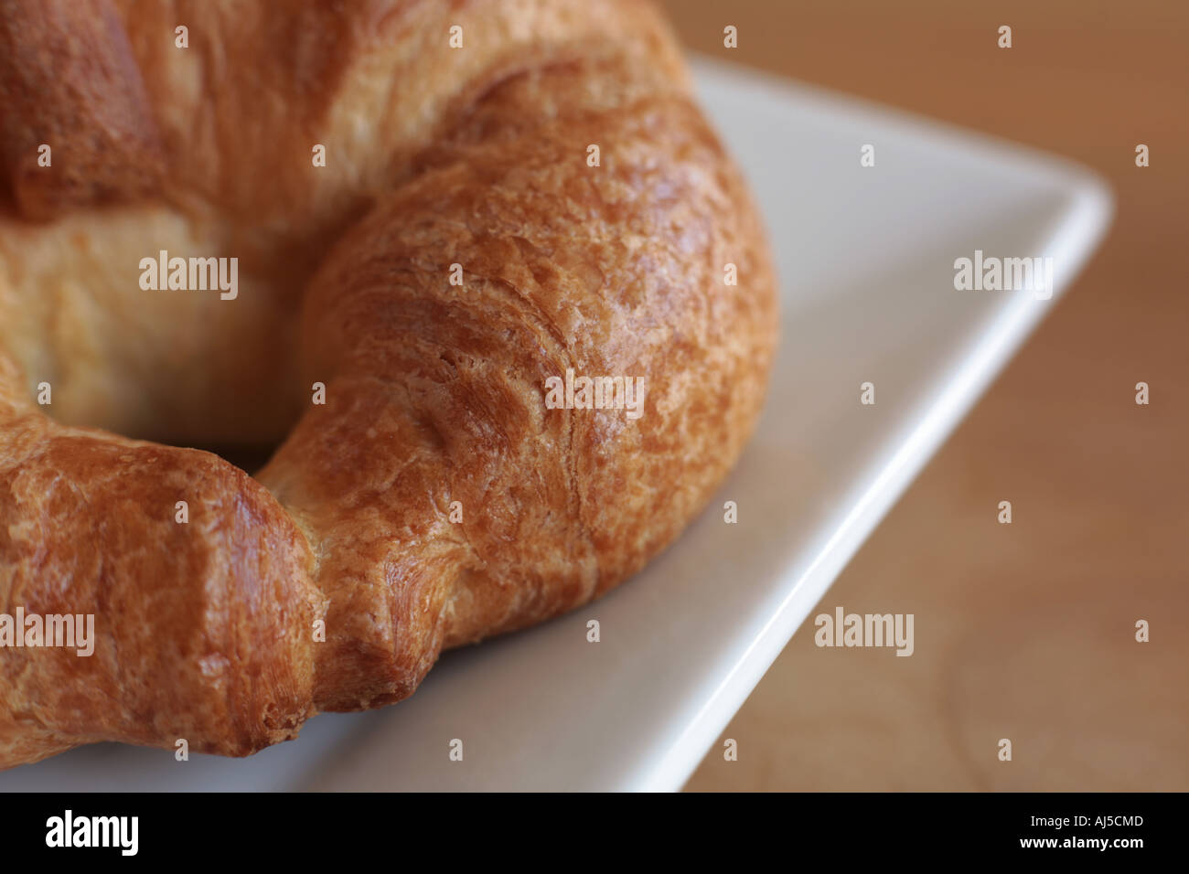 Croissant auf einem Teller Essen Frühstück Kontinentalplatte ernähren Stockfoto