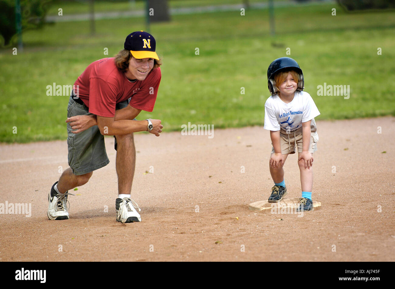 Kinder lernen, Baseball zu spielen Stockfoto