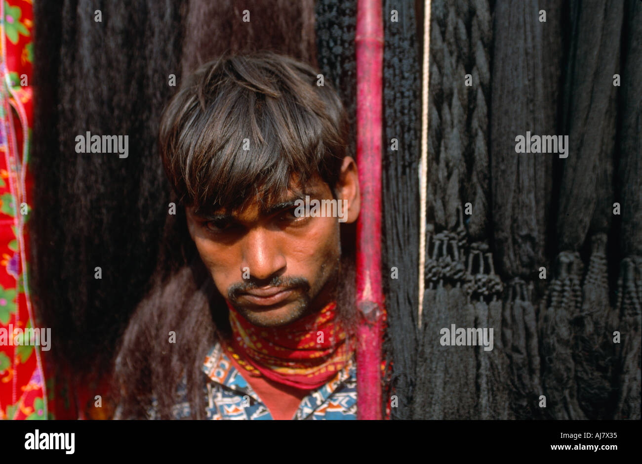 Mann verkaufen Haarverlängerungen, Sonepur Mela, Sonepur, Bihar, Indien Stockfoto